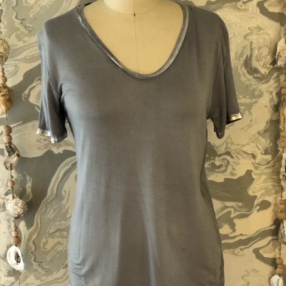 Top edged in silver